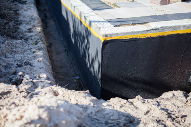 Professional Emergency Waterproofing technician working in Fostoria, OH